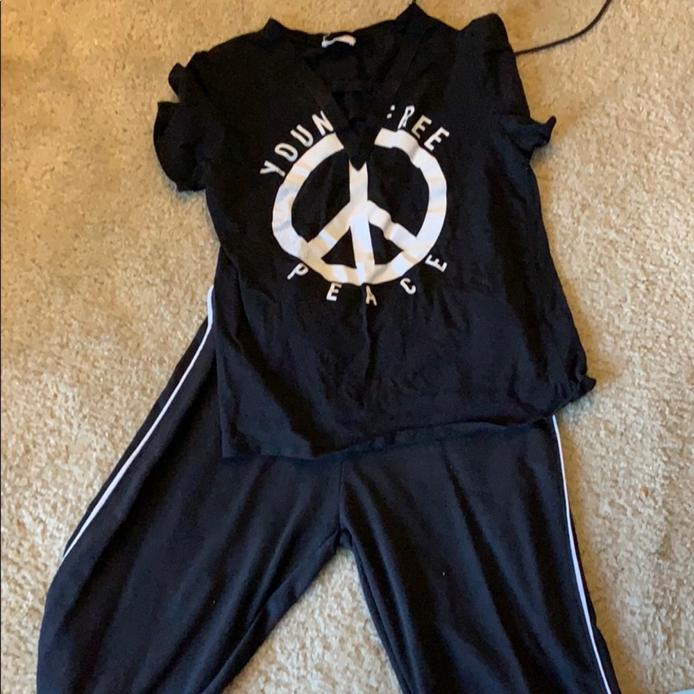 A all black outfit black shirt and black joggers